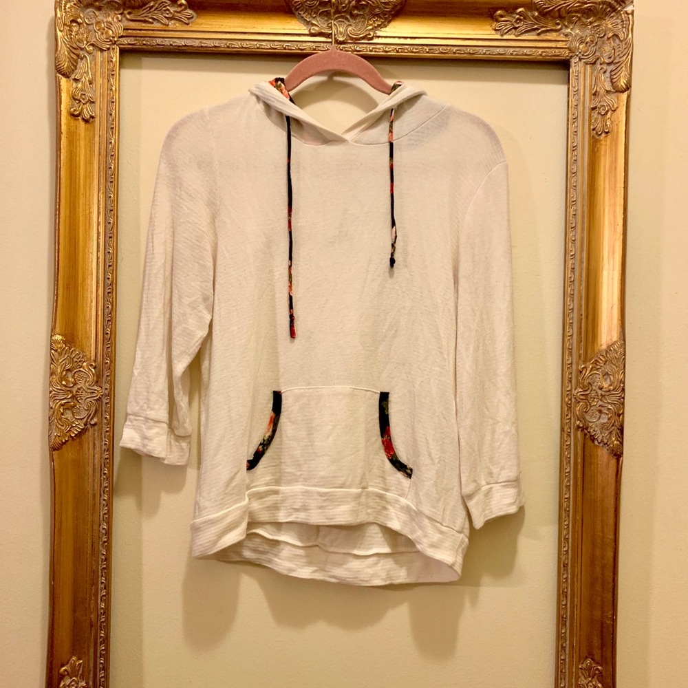cream hoodie with floral hoodie and floral accents